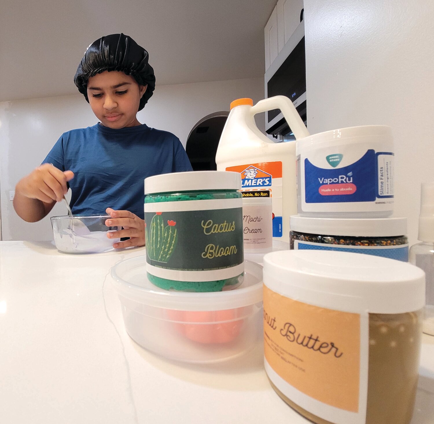 SLIME SALES: A Ferri Middle School seventh-grader may be one of the Ocean State’s youngest entrepreneurs. Penelope Santos, the founder of Angel Stars Slime LLC, makes and sells all sorts of slime. Some of the vast selection is shown here.